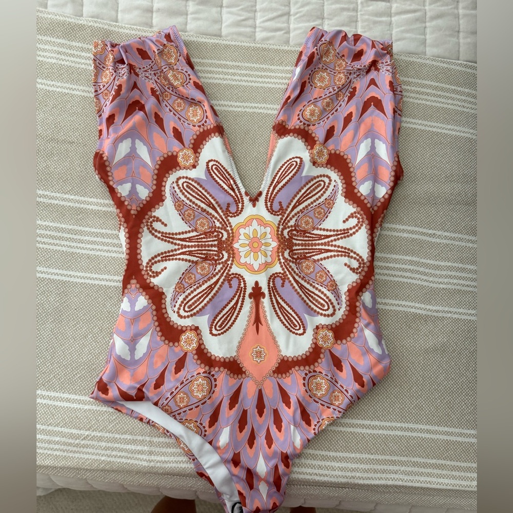 Carolina K one piece never worn